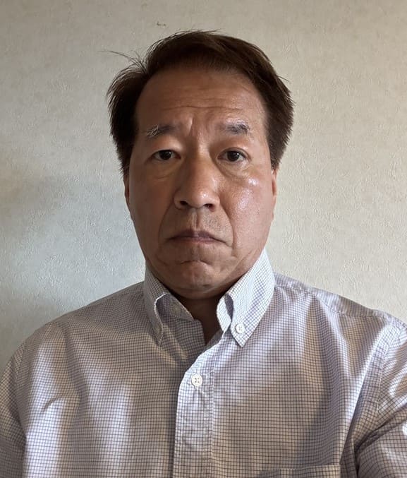 Prof. Yasuharu Den